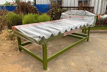 Geelong machinery exported one container：board roller conveyor machine, plywood pneumatic alignment device and square tube for building shed structure to Indone